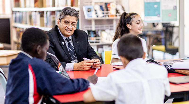 Emmaus Catholic College Kemps Creek Principal Robert Nastasi conversing with students