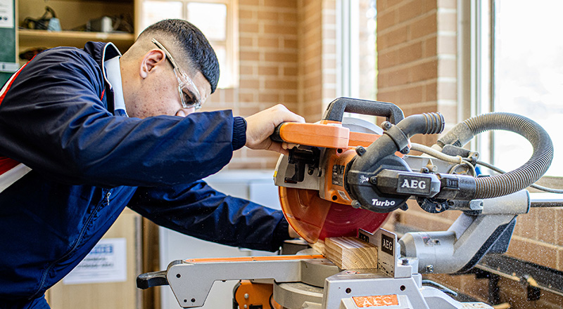 A student engaged in woodwork at Emmaus Catholic College Kemps Creek