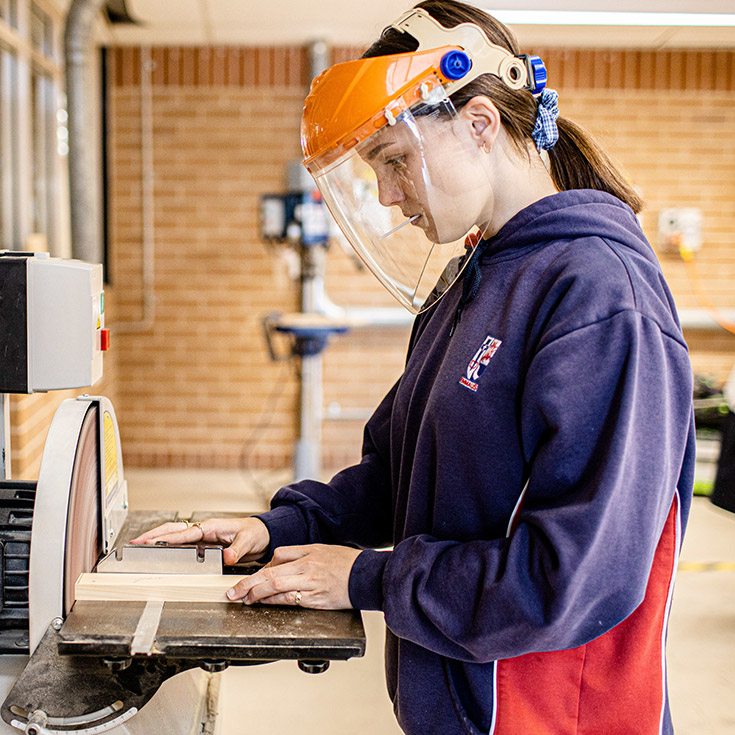 Emmaus Catholic College Kemps Creek student in the woodwork workshop