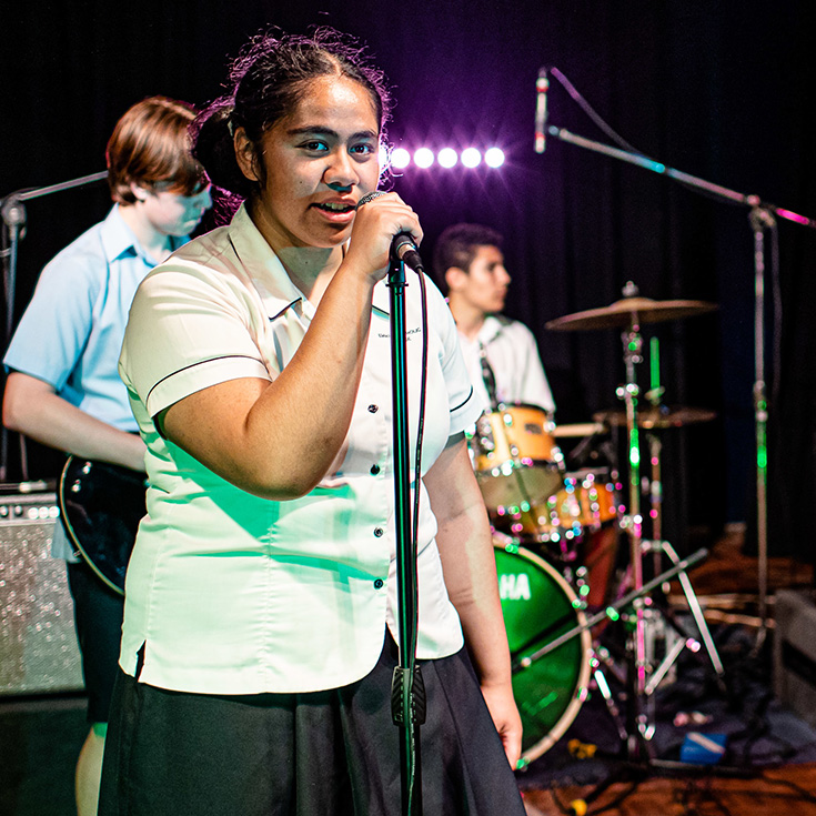 Emmaus Catholic College Kemps Creek band students reherasing and singing