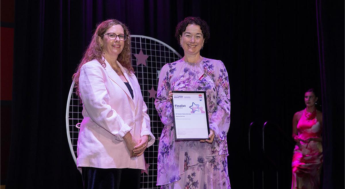 Danielle Nevin receiving award